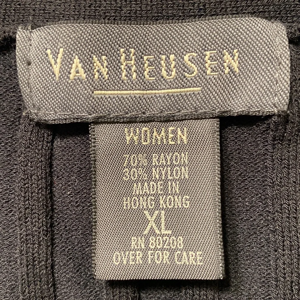 Used Van Heusen cardigan with V necklace and buttons in a front good condition